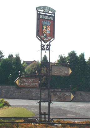 Photograph shows the sign on the Fourways Roundabout. Click to view the Dunblane Street Map.